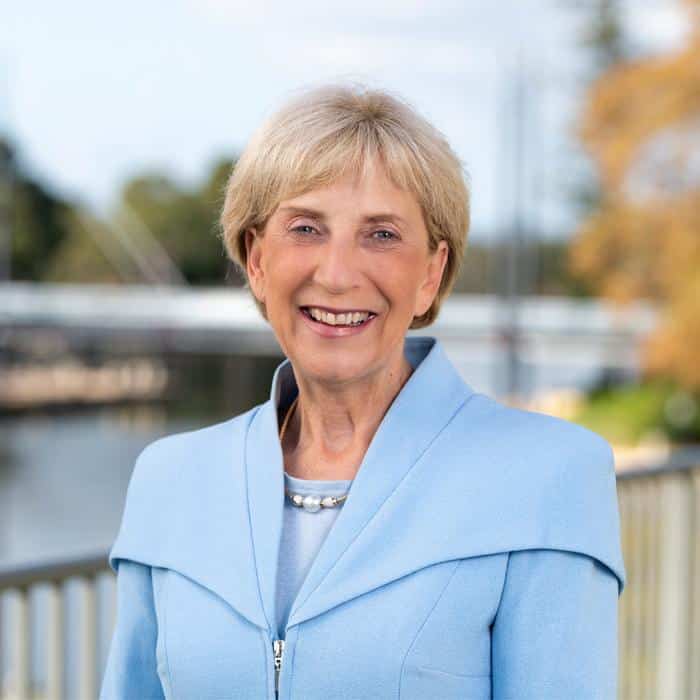 woman in a blue jacket smiling for the camera, Lynas growth strategy
