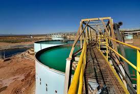 large tank sitting on top of a dirt field, related to US rare earth magnet production