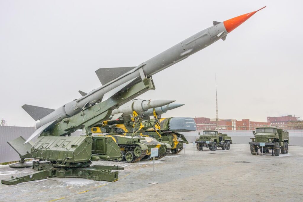 group of military vehicles parked next to each other
