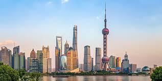 view of a city from across the water showcasing materials science innovation