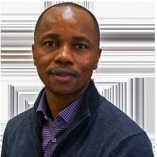 man in a blue jacket and purple shirt related to the rare earth supply chain