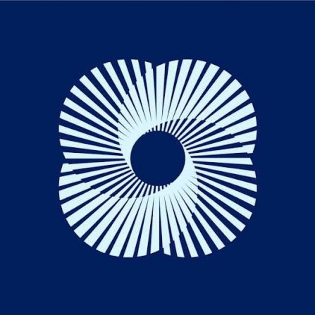 White segmented radial burst forming a hollow circle with evenly spaced rectangular bars radiating outward on deep navy blue