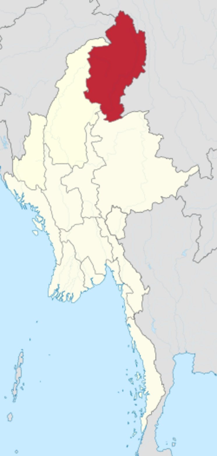 Kachin State marked in dark red in northern Myanmar, bordering China to the northeast and India to the northwest, on a politi