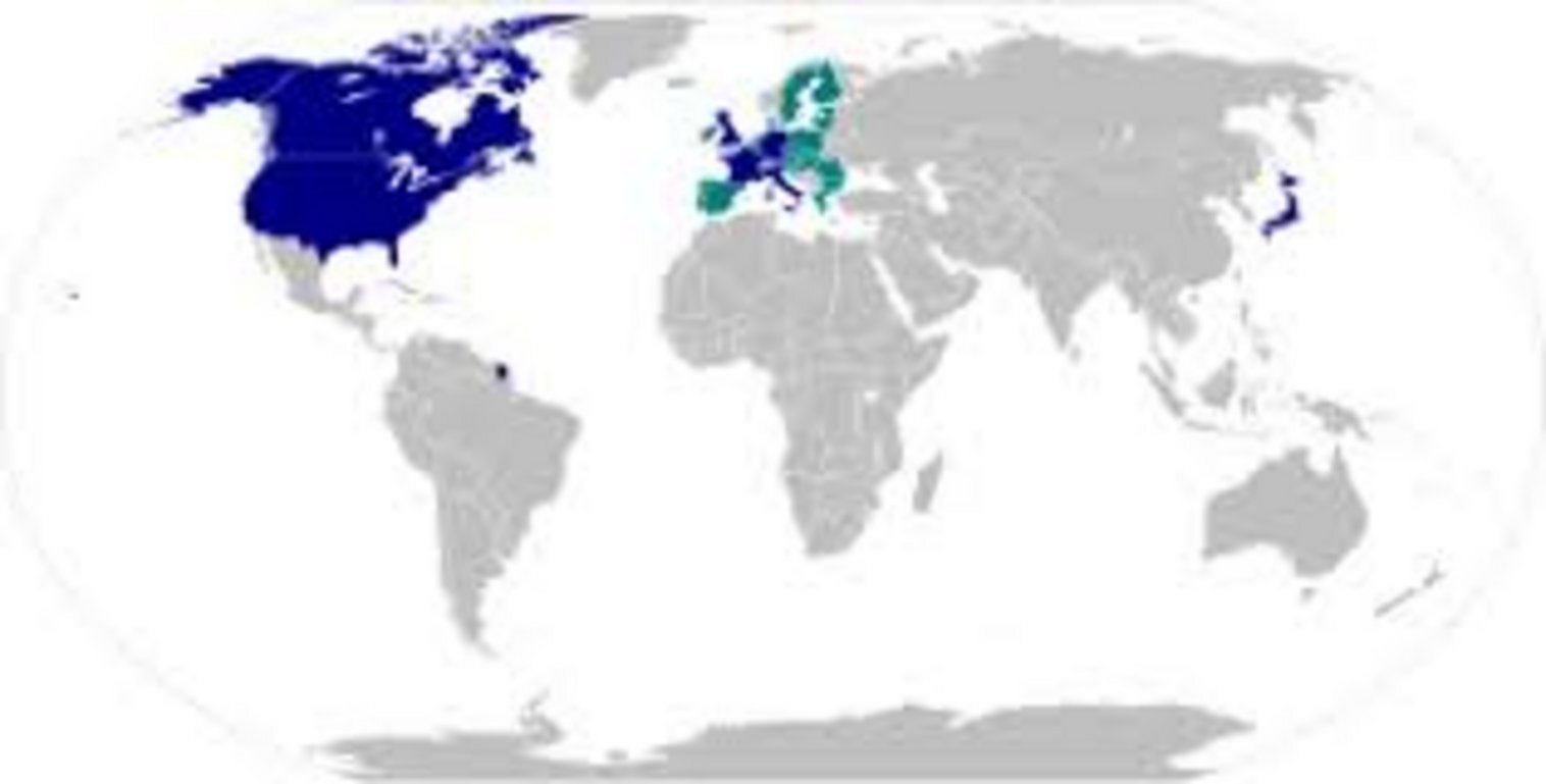 World map with NATO full members in dark blue including USA Canada and Western Europe, candidate or partner nations in teal