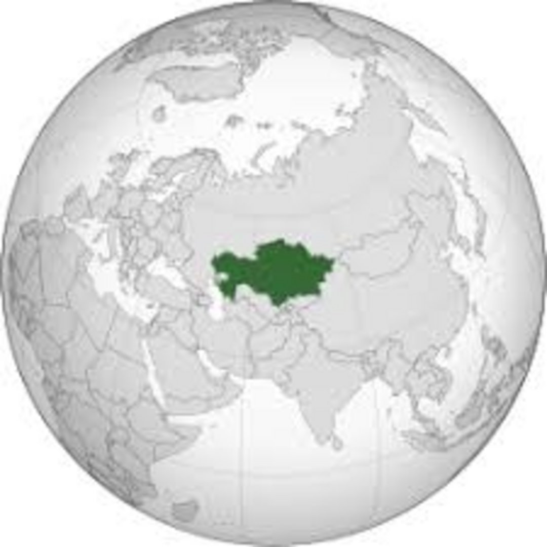 Kazakhstan highlighted in dark green on an orthographic globe projection centered on Central Asia and Eurasia