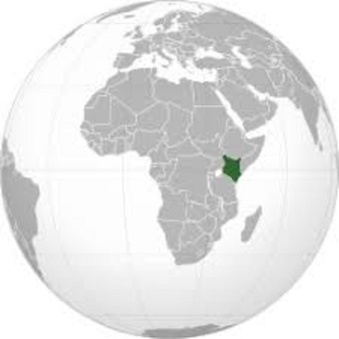 Globe map with Kenya marked in dark green on the East African coast, surrounded by gray African continent nations and Indian
