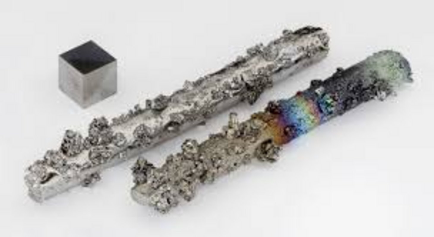 Pure vanadium element samples including two dendritic crystal bars with iridescent rainbow oxidation and one machined cubic s