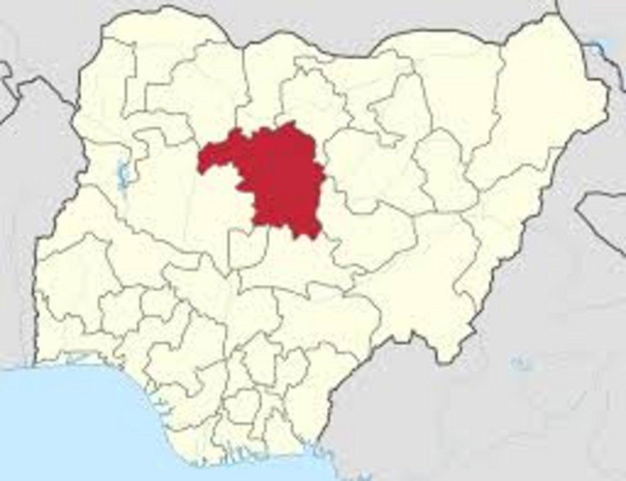 Kaduna State marked in red at north-central Nigeria on a beige administrative map showing all 36 Nigerian states and borders
