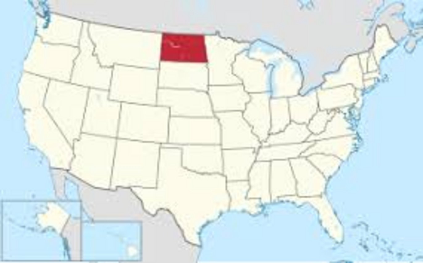 Map of the United States with North Dakota colored in red, bordered by Montana, South Dakota, Minnesota, and Canada
