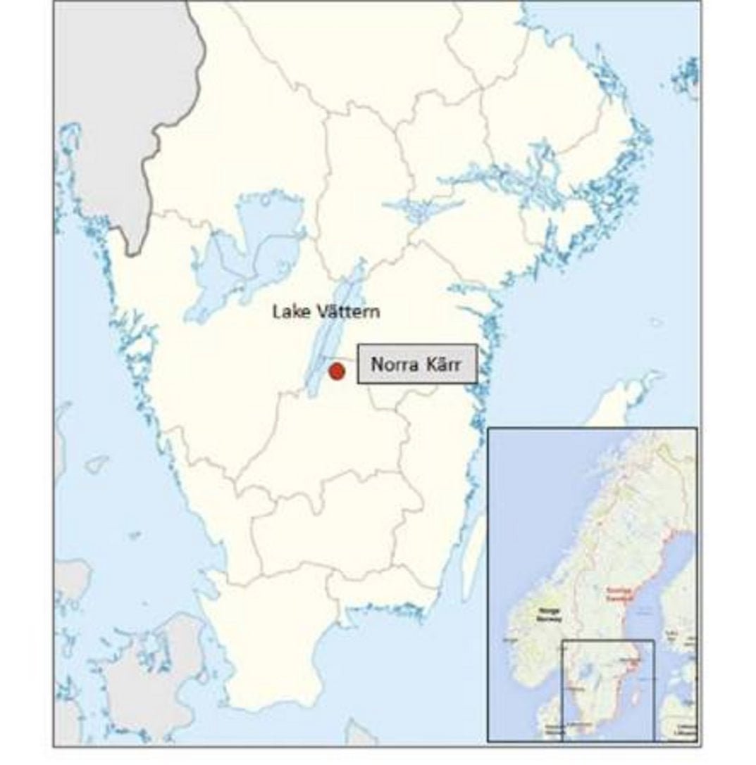 Map of southern Sweden marking Norra Kärr rare earth deposit near Lake Vättern with Scandinavian inset reference map
