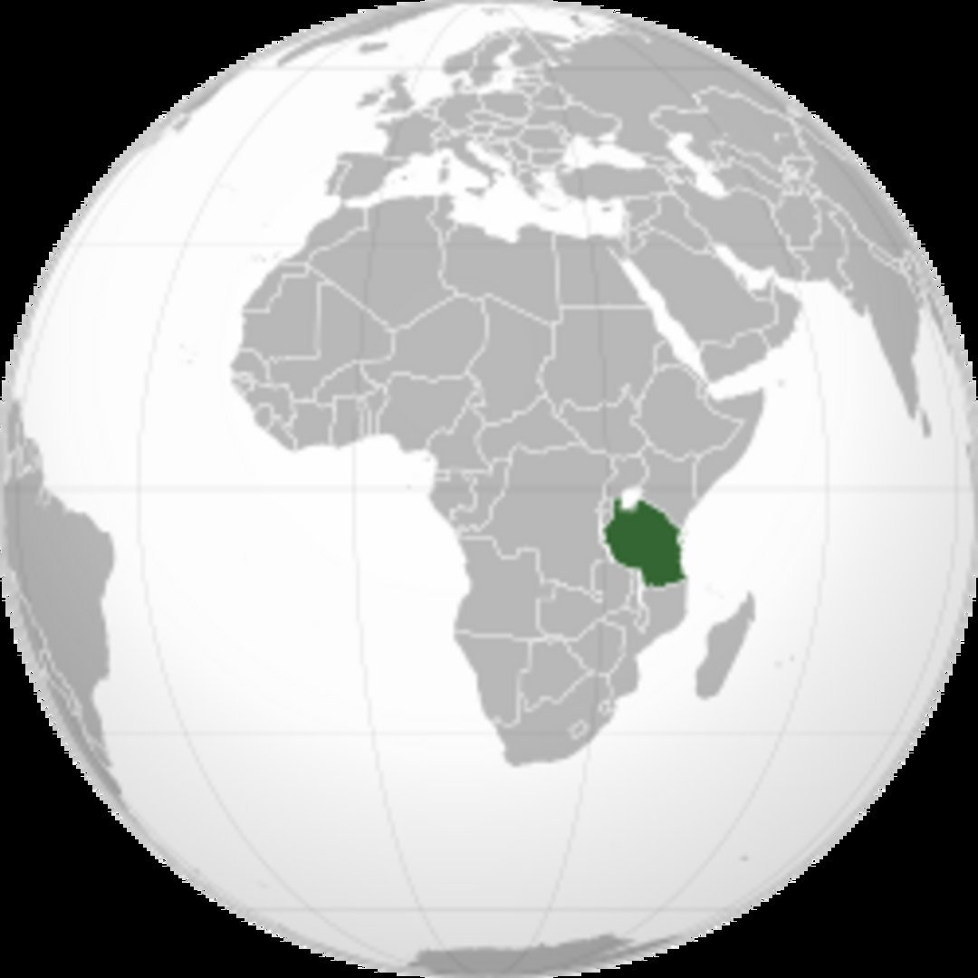 Globe map with Tanzania marked in dark green on the East African coast, bordered by Kenya, Uganda, and Mozambique