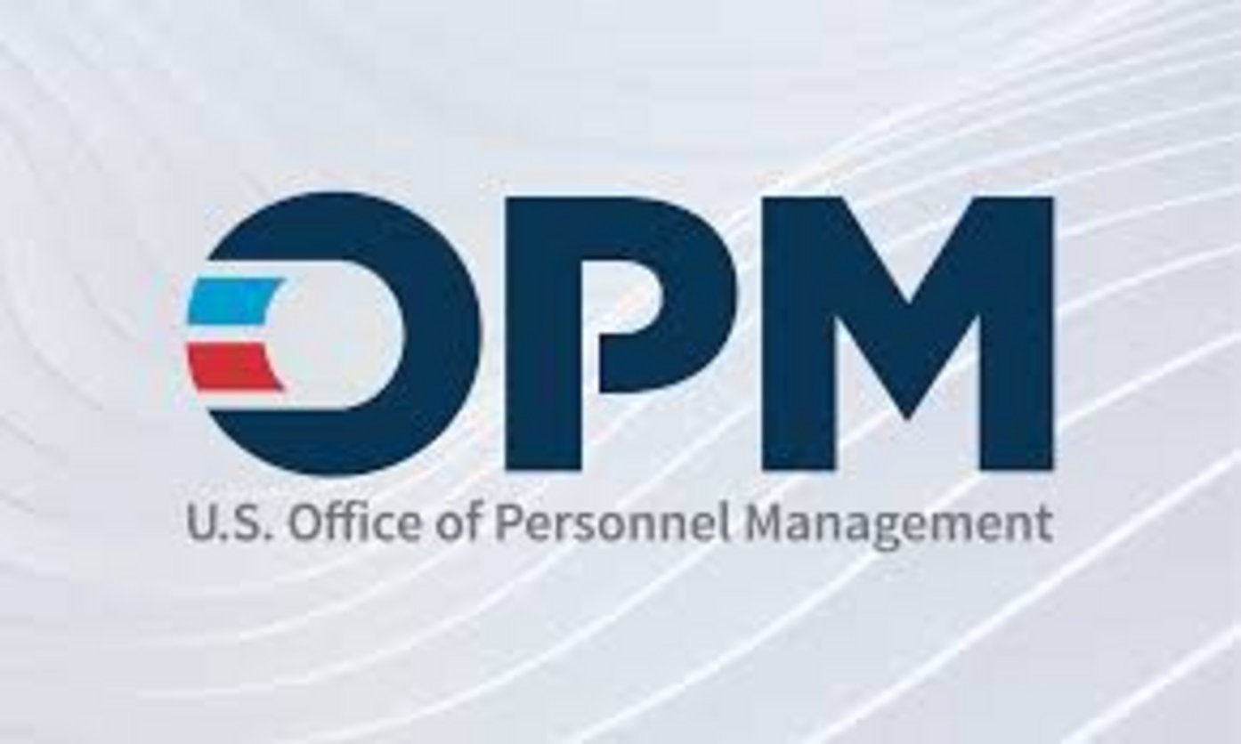 Official OPM logo of the U.S. Office of Personnel Management featuring dark navy blue letters with red and blue flag emblem o
