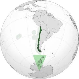 Orthographic globe map highlighting Chile in dark green along South America's western coast, with Chilean Antarctic Territory