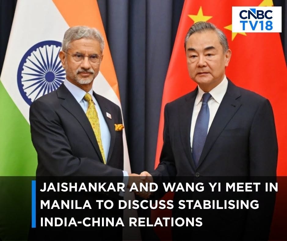 Indian External Affairs Minister S. Jaishankar shaking hands with Chinese Foreign Minister Wang Yi at Manila bilateral talks,