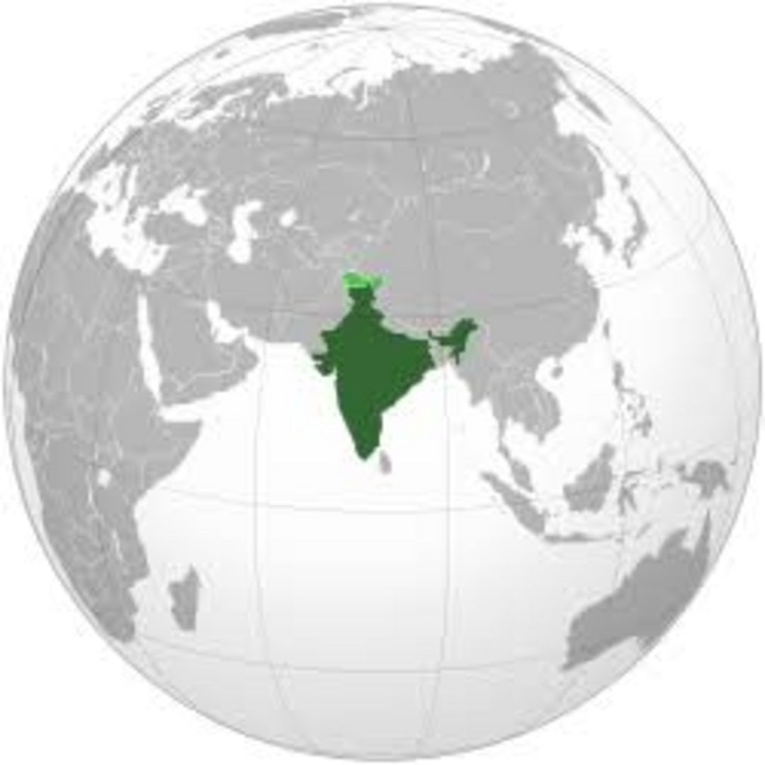 India marked in dark green on a globe centered over South Asia, with lighter green indicating disputed Kashmir territory to t