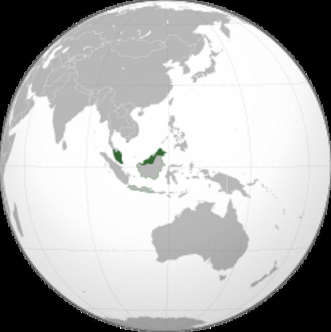 Malaysia marked in dark green on a globe, spanning Peninsular Malaysia and Borneo, surrounded by Southeast Asia and Australia