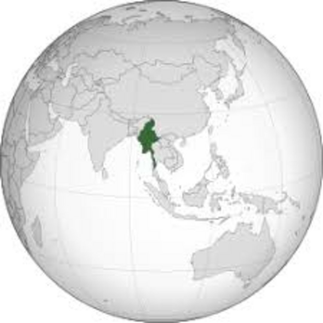 Myanmar (Burma) highlighted in green on an orthographic globe projection, situated between India, China, and Southeast Asia