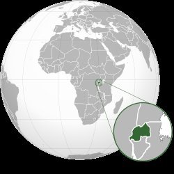 Orthographic globe map highlighting Rwanda in dark green in Central Africa, with an enlarged inset detail of Rwanda and neigh