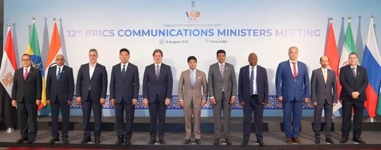 Twelve BRICS Communications Ministers standing in formal group pose at 12th BRICS Communications Ministers Meeting in Pune In