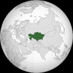 Kazakhstan marked in dark green on a globe map centered on Central Asia, surrounded by Russia, China, and neighboring countri