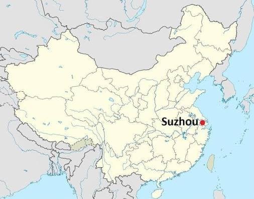 Red dot marking Suzhou city on a political map of China, located in Jiangsu Province along the eastern coast near Shanghai
