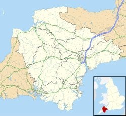 Devon County road and boundary map with rivers settlements and small inset locator map of England highlighting Devon in south