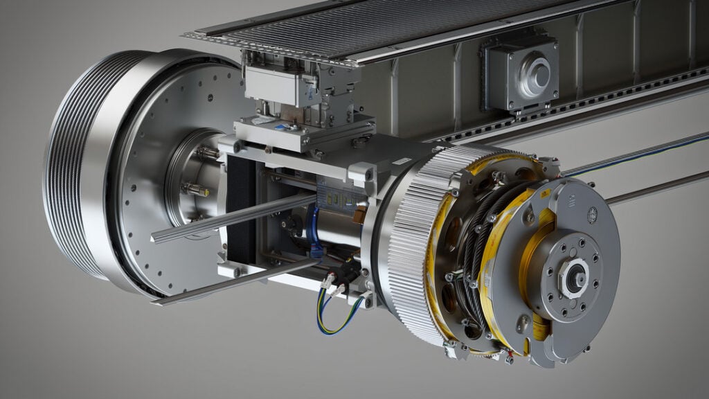 Photorealistic close-up of an **elevator motor** gearless traction unit above a hoistway, showing the traction sheave with tensioned steel cables, cooling-finned housing, brake caliper, encoder, and an open panel revealing rotor–stator details amid realistic industrial lighting and wiring.